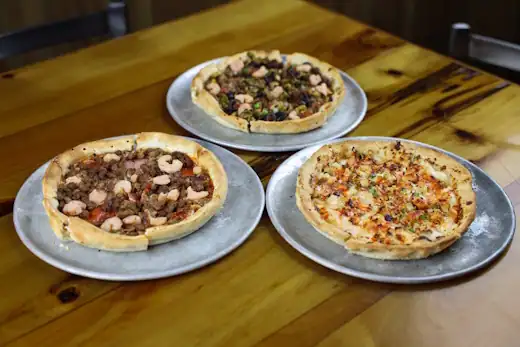 dups pizza 3 specialty pizzas.webp